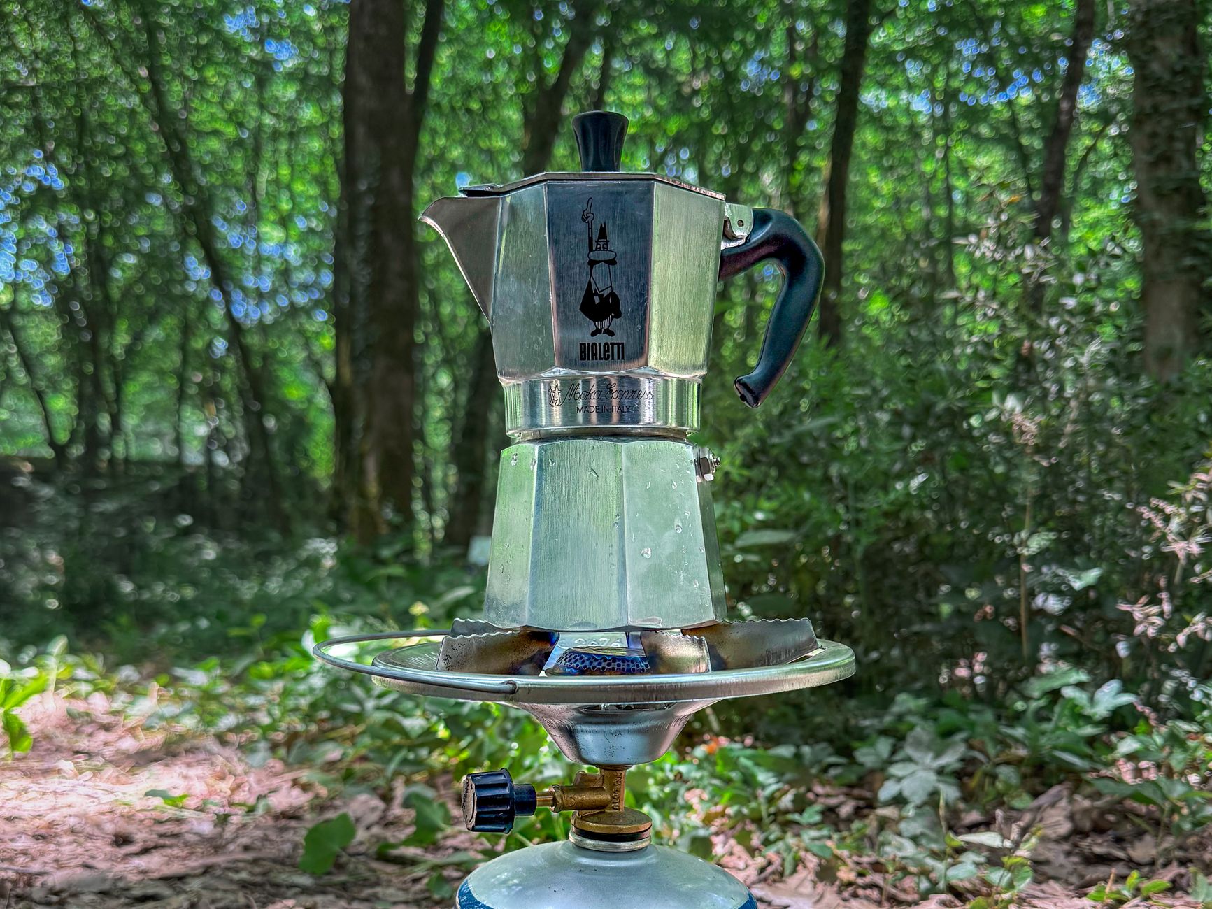 A moka pot spitting and sputtering on the stove