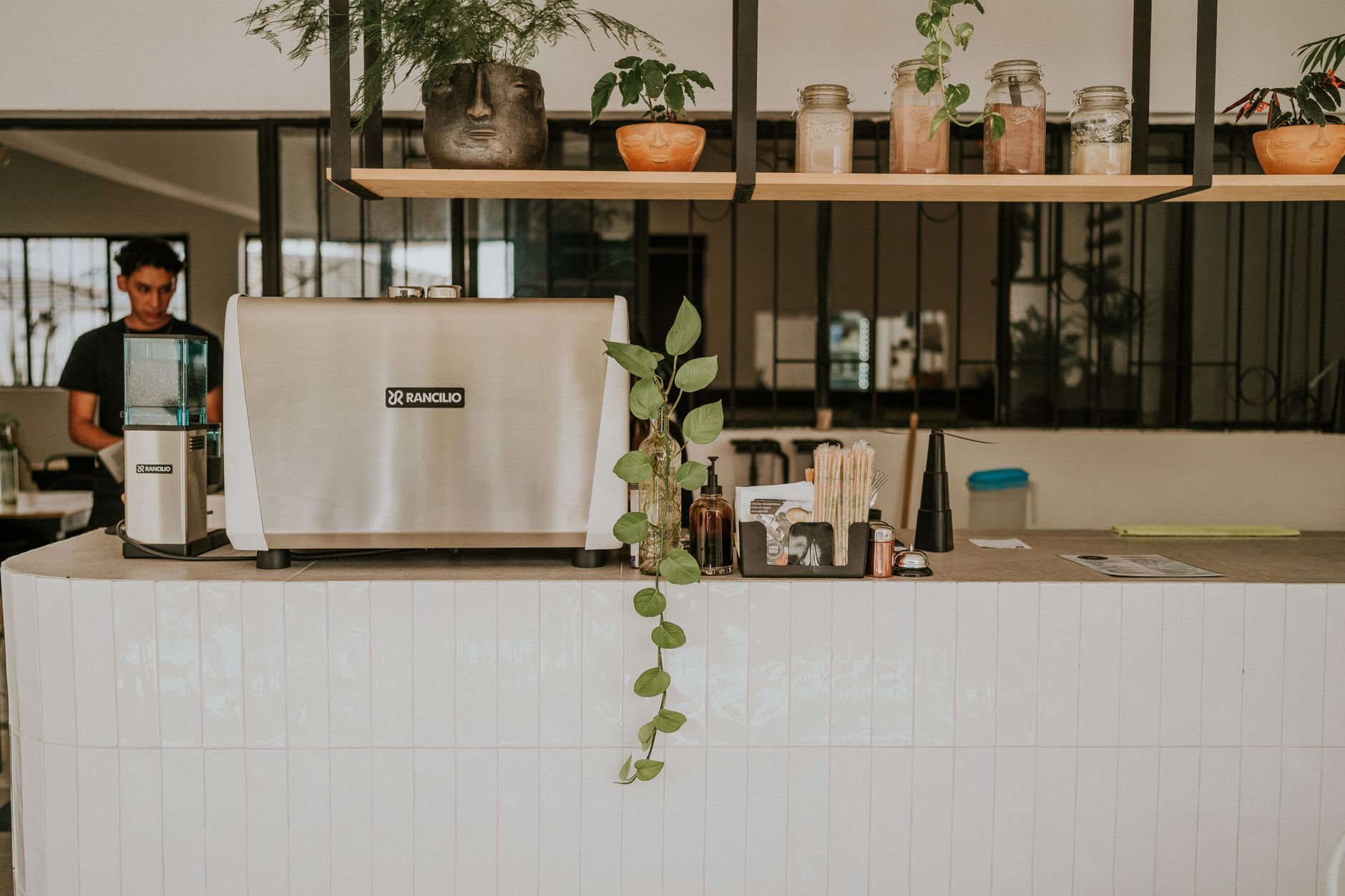 People standing at a Neapolitan bar counter drinking espresso